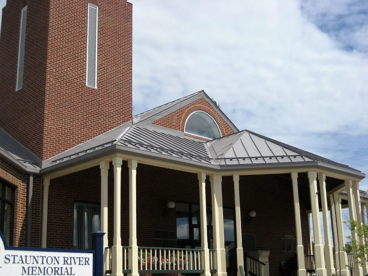 Skilled roofing craftsmen working on a residential roof in Wayne